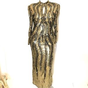 34. Judith Ann Creation Black & Gold Fully Sequin Long Sleeved Gown. Med